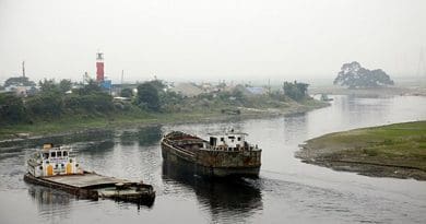 Boats pass each other along a Dhaka stretch of the Turag River, where the government plans to build a township along the waterway on the outskirts of the Bangladeshi capital, Dec. 27, 2019. Megh Monir/BenarNews