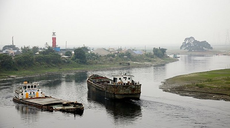 Boats pass each other along a Dhaka stretch of the Turag River, where the government plans to build a township along the waterway on the outskirts of the Bangladeshi capital, Dec. 27, 2019. Megh Monir/BenarNews