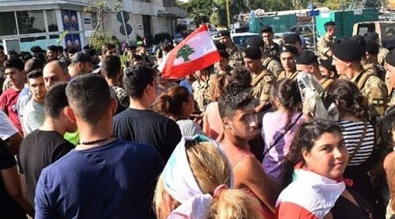 Protestors in Lebanon face off against army. Photo Credit: Tasnim News Agency