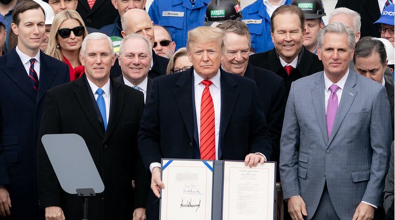 President Donald J. Trump, joined by Vice President Mike Pence and U.S. Trade Representative Robert Lighthizer, signs the United States-Mexico-Canada Trade Agreement Wednesday, Jan. 29, 2020, in front of the South Portico of the White House. (Official White House Photo by D. Myles Cullen)