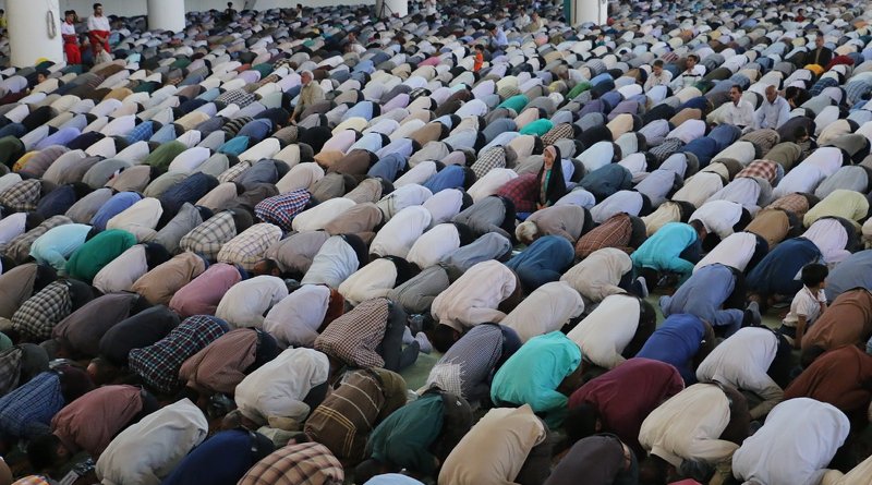 Muslims praying. Photo by Matin Firouzabadi at Unsplash