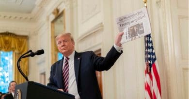 President Donald J. Trump shows a newspaper headline during his address Thursday, Feb. 6, 2020 in the East Room of the White House, in response to being acquitted in the U.S. Senate Impeachment Trial. (Official White House Photo by D. Myles Cullen)
