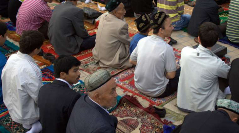 Uyghurs at a mosque in Kashgar, Xinjiang, China, September 2010. Credit: Preston Rhea via Flickr (CC BY-SA 2.0).
