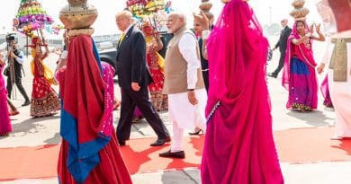 President Donald J. Trump and Indian Prime Minister Narendra Modi walk along a cordon of cultural performers upon President Trump’s arrival Monday, Feb. 24, 2020, to Sardar Vallabhbhai Patel International Airport in Ahmedabad, India. (Official White House Photo by Shea Craighead)
