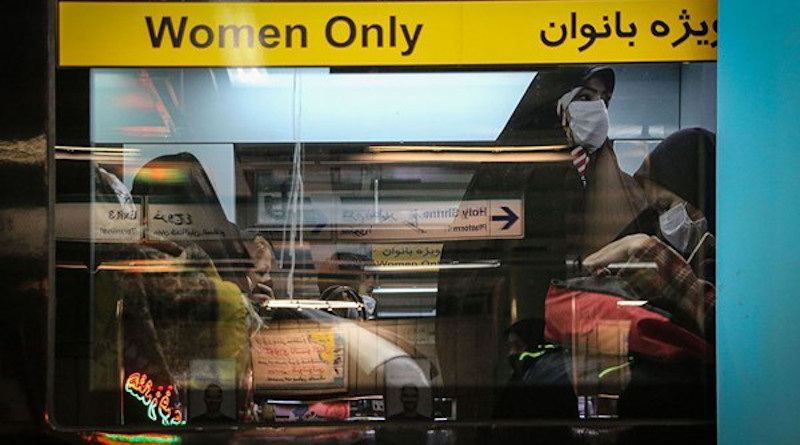 Women riding public transportation wearing masks in Iran. Photo Credit: Fars News Agency
