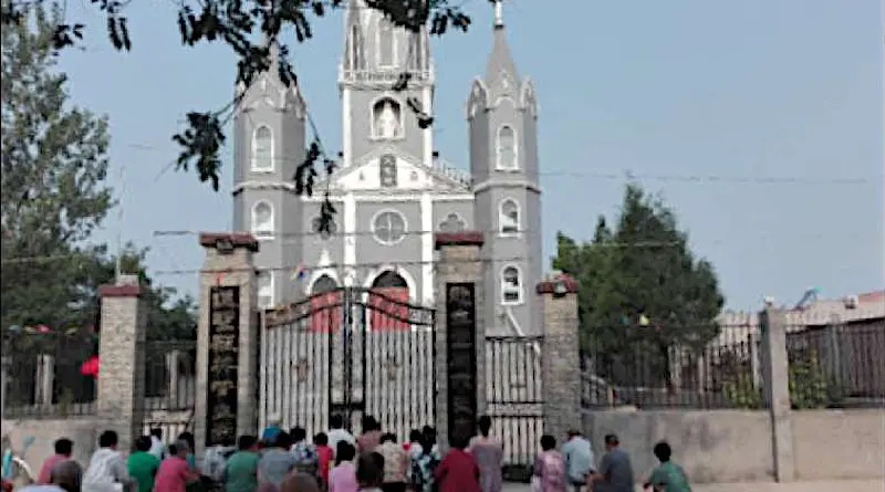 Catholics pray outside of a Catholic Church in Nanma, China, June 2019. Credit: Bitter Winter