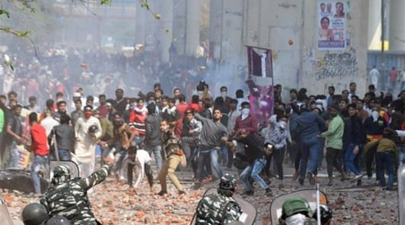 Protestors clash with security forces in Delhi, India. Photo Credit: Tasnim News Agency