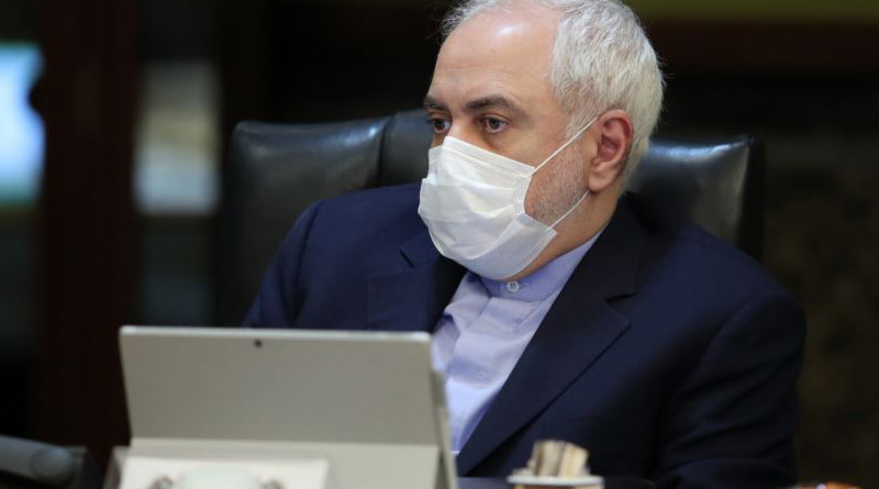 Iran's Foreign Minister Mohmmad Javad Zarif wears a protective mask as a means of protection against COVID-19 during a cabinet meeting in Tehran on March 11. Photo Credit: President.Ir