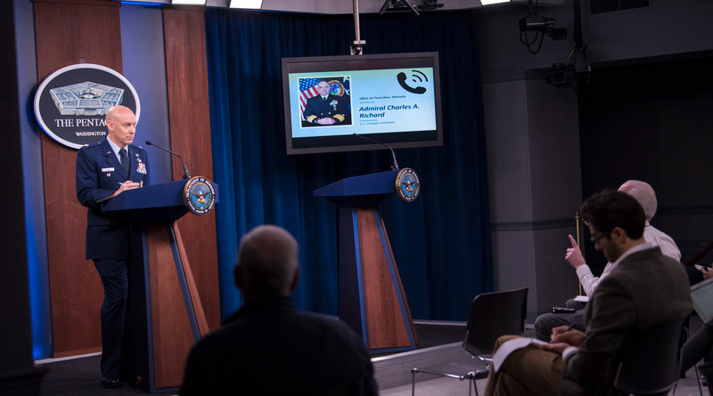 Navy Adm. Charles A. Richard, commander of U.S. Strategic Command, briefs reporters at the Pentagon via telephone from Offutt Air Force Base, Neb., about Stratcom's response to COVID-19, March 17, 2020. The admiral is pictured on the monitor. Photo Credit: Lisa Ferdinando, DOD