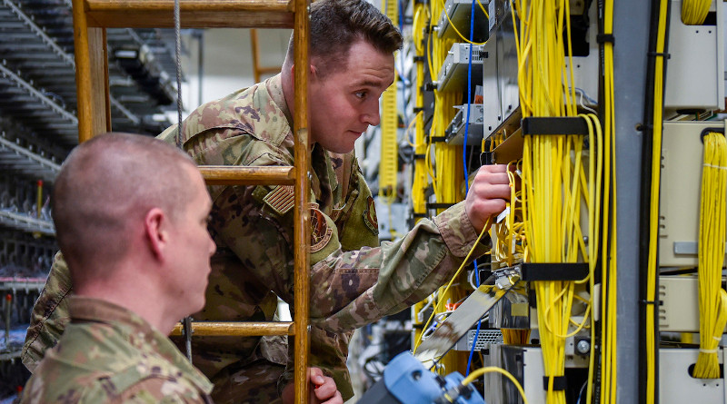 Airmen troubleshoot the fiber optic distribution panels, Feb. 11, 2020, at Eglin Air Force Base, Fla. The fiber optic distribution panels are a part of the critical network infrastructure on base. Photo Credit: Air Force 2nd Lt. Christine Saunders