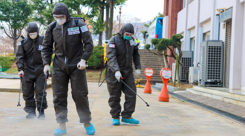 spray a COVID-19 infected area with a solution of disinfectant in Daegu, South Korea, March 13, 2020. Photo Credit: Army Spc. Hayden Hallman
