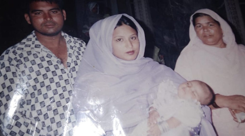 Huma Younus with her parents Younus and Nagina at her baptism in 2005. (Photo supplied)