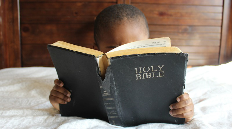 Child Reading Bible Bed African Education Boy