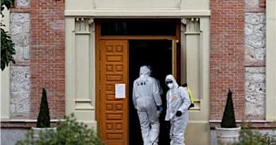 Workers disinfecting a building in fight against coronavirus in Spain. Photo Credit: Tasnim News Agency