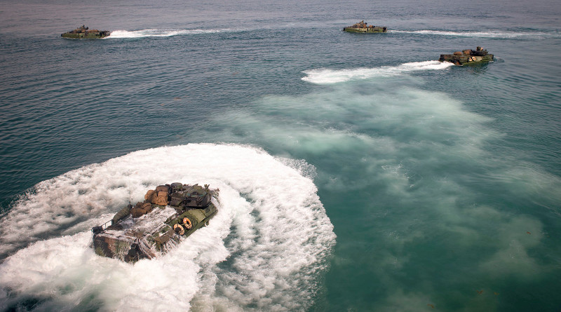 Amphibious assault vehicles launch from the well deck of the USS Oak Hill in the Persian Gulf, Feb. 23, 2020. Photo Credit: Navy Petty Officer 3rd Class Griffin Kersting