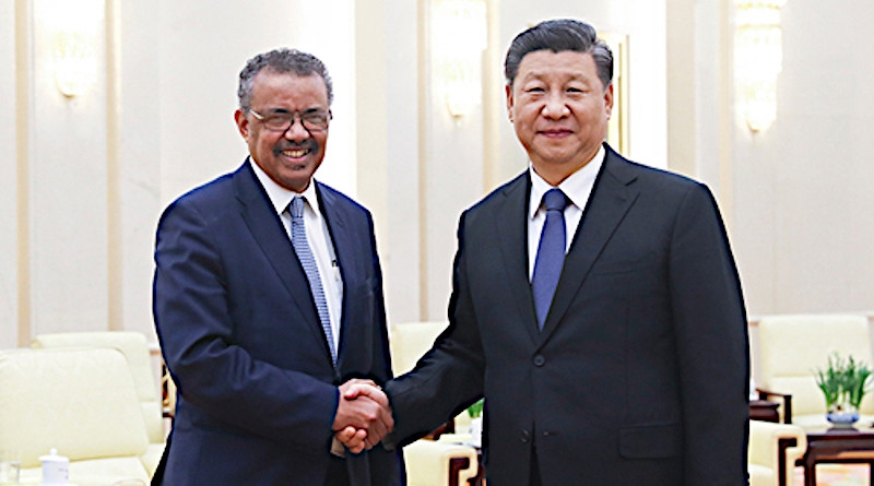 China's President Xi Jinping (right) with WHO's Director-General Tedros Adhanom Ghebreyesus. Photo Credit: China government