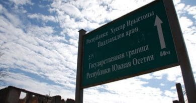 In Dvani the sign in Russian and Ossetian alerts the dividing line; it reads: "The State Border of the Republic of South Ossetia". Photo: Monica Ellena / Civil.ge archive