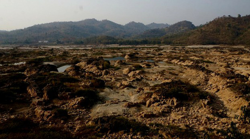 Mud and rocks form the dried-out middle of the Mekong River in Chiang Khong district in northern Thailand’s Chiang Rai province, during a drought that ravaged communities in the Lower Mekong region, Feb. 14, 2020. Nontarat Phaicharoen/BenarNews