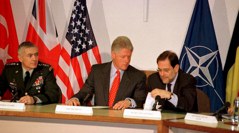 US President Bill Clinton (centre), the architect of NATO's expansion up to Russia's borders, with NATO Secretary General Javier Solana (right) and General Wesley Clark (left), the Supreme Allied Commander Europe of NATO from 1997 to 2000, at NATO headquarters. Credit: NATO.