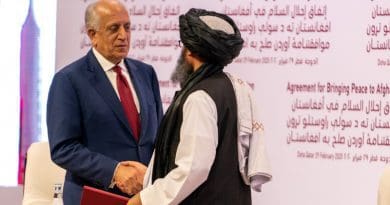 US Special Representative for Afghanistan Reconciliation Zalmay Khalilzad and Taliban co-founder Mullah Abdul Ghani Baradar shake hands after signing a landmark peace agreement in ceremony at Qatari capital Doha on February 29, 2020. Photo Credit: State Department photo by Ron Przysucha/ Public Domain