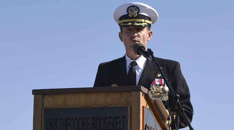 File Photo: Capt. Brett Crozier addresses the crew for the first time as commanding officer of the aircraft carrier USS Theodore Roosevelt (CVN 71) during a change of command ceremony. (U.S. Navy/Mass Communication Specialist 3rd Class Sean Lynch)