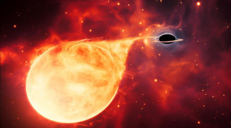 This artist's impression depicts a star being torn apart by an intermediate-mass black hole (IMBH), surrounded by an accretion disc. This thin, rotating disc of material consists of the leftovers of a star which was ripped apart by the tidal forces of the black hole. CREDIT ESA/Hubble, M. Kornmesser