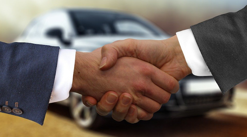 car auto sell dealer sale handshake