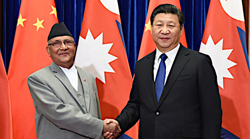 File photo of China's President Xi Jinping with Prime Minister K.P. Sharma Oli of Nepal.