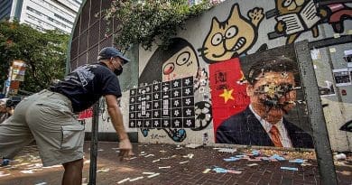 Hong Kong protesters threw eggs at the portrait of General Secretary of the Communist Party of China and paramount leader of China Xi Jinping. Photo Credit: Studio Incendo, Wikipedia Commons