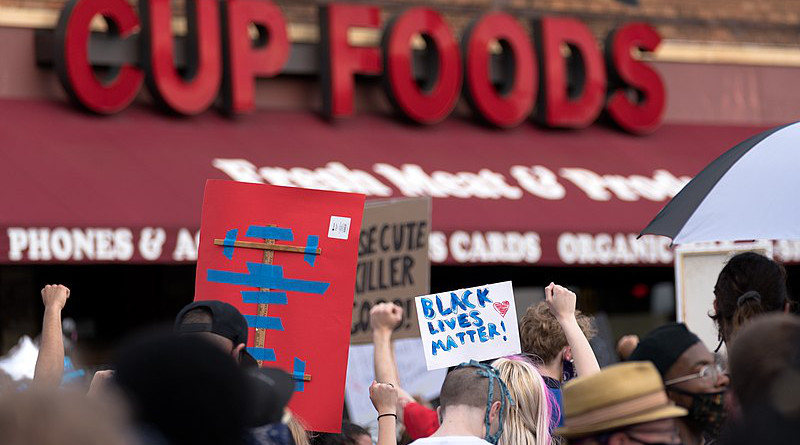 Protesters gather at the site on May 26, the day after George Floyd's death. Photo Credit: Lorie Shaull, Wikipedia Commons.