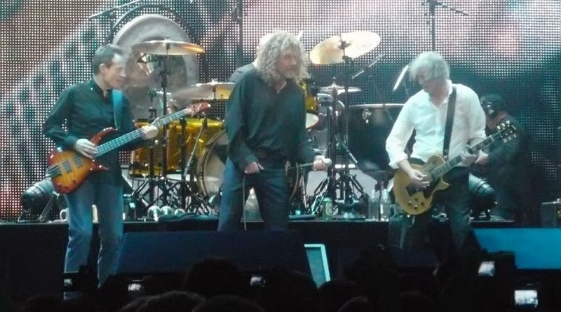 Led Zeppelin in 2007, from left to right: John Paul Jones, Robert Plant, and Jimmy Page (Jason Bonham is obscured, sitting at the drum set). Photo Credit: p_a_h, Wikipedia Commons.