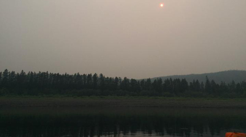 View of Siberian waterway after a forest fire -- smoke and soot linger in the air for several days even after rainfall. UNH researchers find aftereffects of a burn can last up to five decades and could have major implications on vital waterways. CREDIT: Bianca Rodriguez-Cardona/UNH