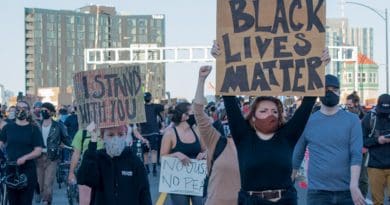 Black Lives Matter protesters cross the Burnside Bridge in Portland, Oregon. Protests in the aftermath of the killing George Floyd. Photo Credit: Henryodell, Wikipedia Commons