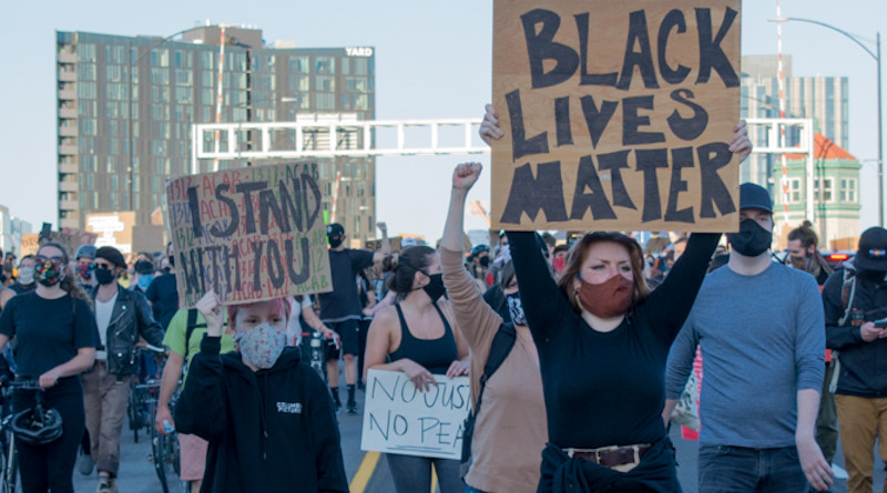 Black Lives Matter protesters cross the Burnside Bridge in Portland, Oregon. Protests in the aftermath of the killing George Floyd. Photo Credit: Henryodell, Wikipedia Commons