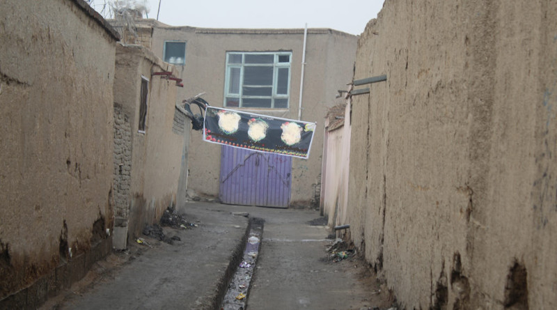 A banner in an alley, as a memorial to Sajaad and two other youth killed in the explosion. Photo Credit: Dr. Hakim Young