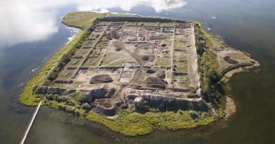 This is an aerial view of Por-Bajin from the west. The complex is situated on an island in a lake. Scientists have pinned its construction on the year 777 CE, using a special carbon-14 dating technique, based on sudden spikes in the carbon-14 concentration. CREDIT Andrei Panin