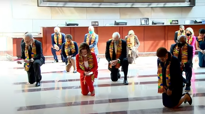 Speaker of the United States House of Representatives Nancy Pelosi and Congressional Black Caucus Democrats kneel for 8 minutes 46 seconds to honor George Floyd wearing kente cloth.