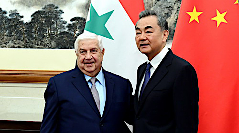 File photo of Foreign Minister Walid Muallem of Syria (left) and China's State Councilor and Foreign Minister Wang Yi. Photo Credit: Chinese Foreign Ministry