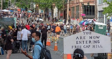 Western entrance to Seattle's Capitol Hill Autonomous Zone (CHAZ). Photo Credit: Alex Glidewell, Wikipedia Commons.