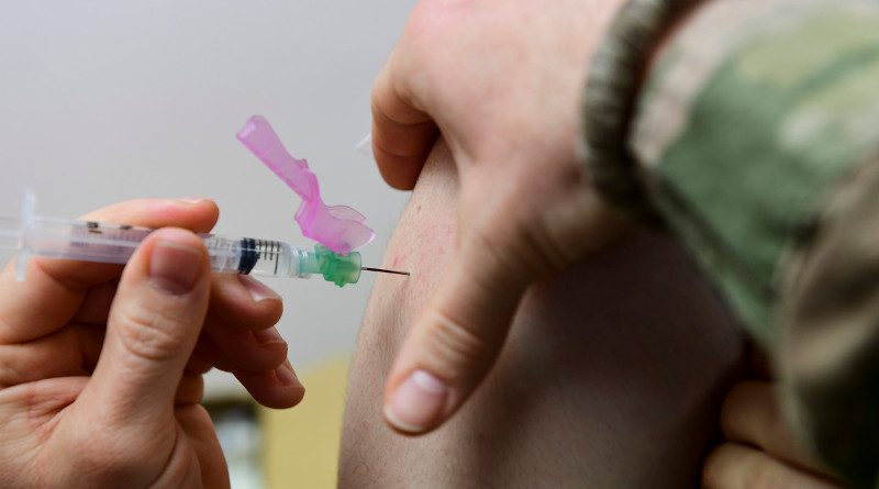A service member receives a vaccination at the Marine Corps Reserve Center in North Versailles, Pa., April 6, 2019. Photo Credit: Joshua Seybert, Air Force