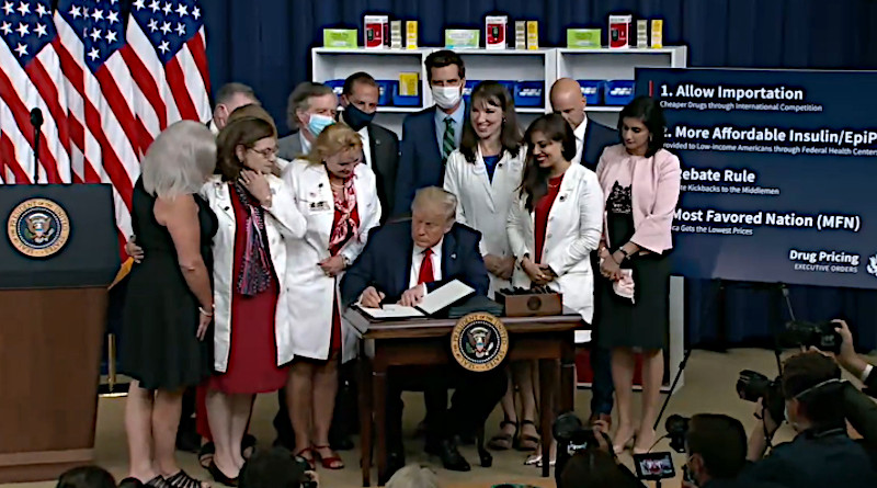 US President Donald Trump signs four Executive Orders to Lower prescription drug prices. Photo Credit: Screenshot White House video