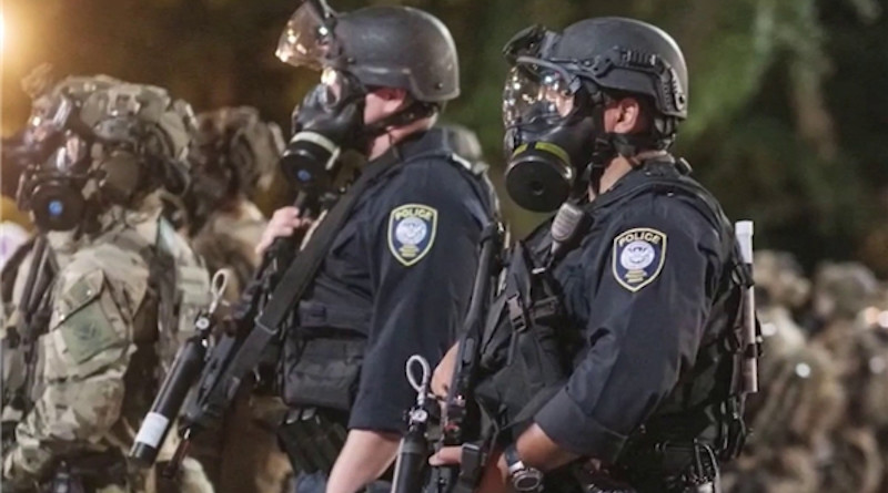 Police with alleged US Federal agents in Portland, Oregon. Photo Credit: Fars News Agency