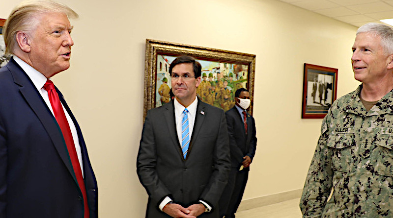 President Donald J. Trump talks with Defense Secretary Dr. Mark T. Esper and Navy Adm. Craig Faller, commander of U.S. Southern Command, at Southcom headquarters in Doral, Fla. Photo Credit: DoD