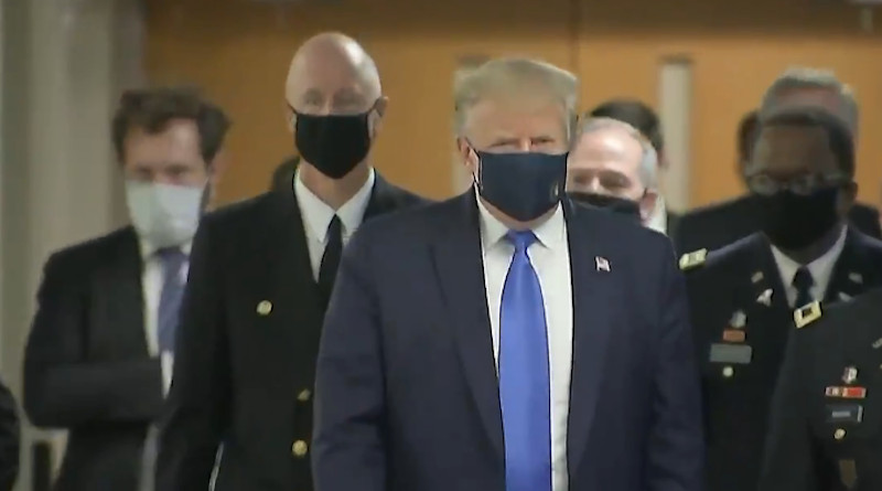 US President Donald Trump wears a mask during a visit to Walter Reed National Military Medical Center. Photo Credit: Screenshot White House video