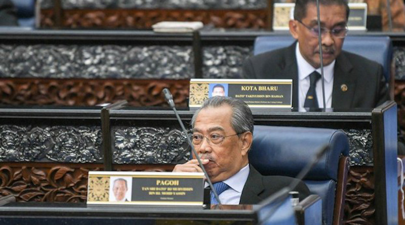 Malaysian Prime Minister Muhyiddin Yassin (front) sits in Parliament in Kuala Lumpur. Photo Credit: S. Mahfuz/BenarNews