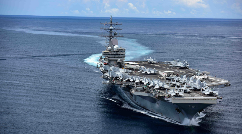 The US Navy's aircraft carrier USS Ronald Reagan transits the San Bernardino Strait, crossing from the Philippine Sea into the South China Sea. U.S. Navy photo by Mass Communication Specialist 3rd Class Jason Tarleton/Released
