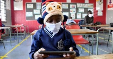 Children return to school in South Africa. Photo Credit: SA News