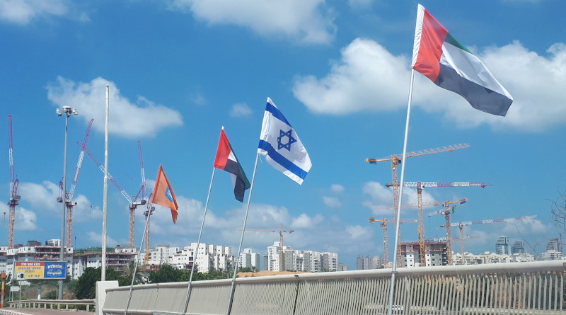 Flags of Israel and the United Arab Emirates (UAE), together with the flag of Netanya, flown on Netanya's "Peace Bridge" over Highway 2, Netanya, Israel. Photo Credit: TaBaZzz, Wikipedia Commons