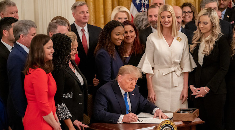 President Trump signs an Executive Order at the White House Summit on Human Trafficking in honour of the 20th Anniversary of the Trafficking Victims Protection Act of 2000, Jan. 31, 2020. Official White House Photo by Andrea Hanks.