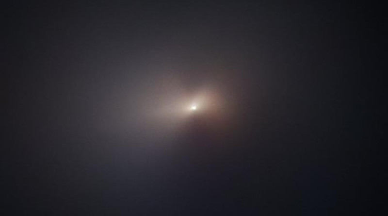 The NASA/ESA Hubble Space Telescope has captured the closest images yet of the sky's latest visitor to make the headlines, comet C/2020 F3 NEOWISE, after it passed by the Sun. This color image of the comet was taken on 8 August 2020. The two structures appearing on the left and right sides of the comet's center are jets of sublimating ice from beneath the surface of the nucleus, with the resulting dust and gas bring squeezed through at a high velocity. The jets emerge as cone-like structures, then are fanned out by the rotation of the comet's nucleus. CREDIT: NASA, ESA, Q. Zhang (California Institute of Technology), A. Pagan (STScI)